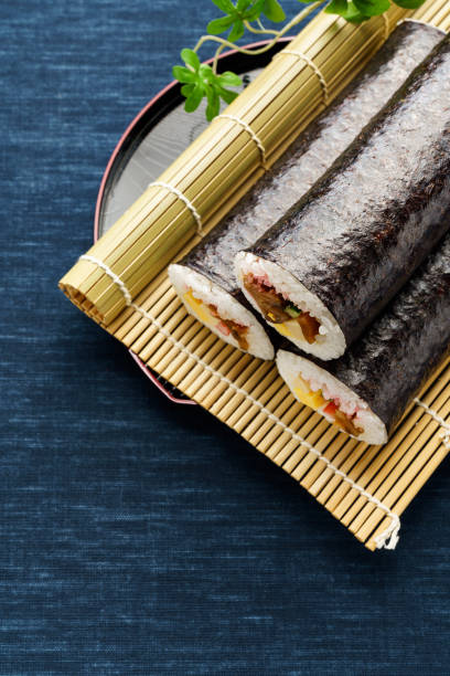 istock Eho-maki are thick sushi rolls which is believed to bring good fortune if eaten while facing the year's 