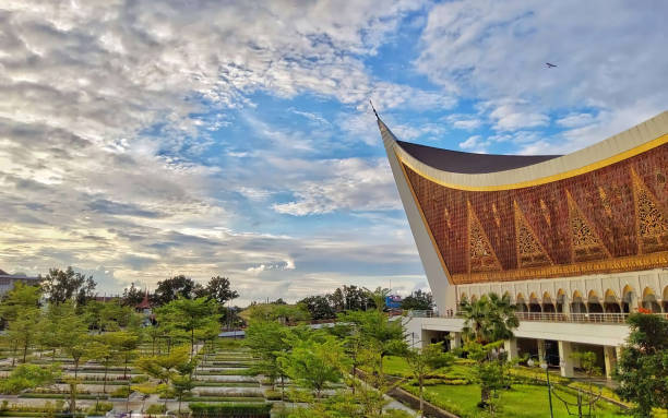 Bukittinggi, Indonesia - December 22, 2013:  Minangkabau traditional hous.  Bukittinggi is the second biggest city in West Sumatra. It is located near the volcanoes Mount Singgalang and Mount Marapi