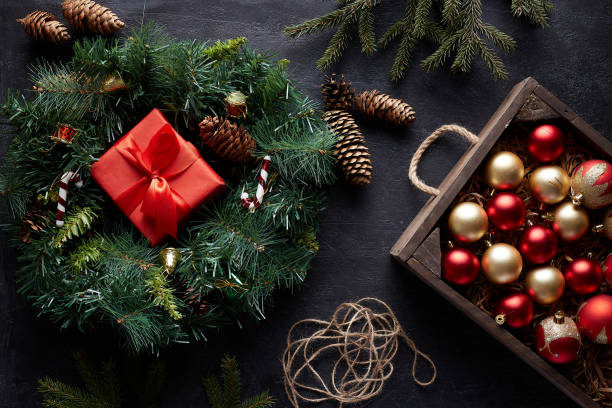 istock Christmas wreath on black concrete background. Covid-19 1285940890