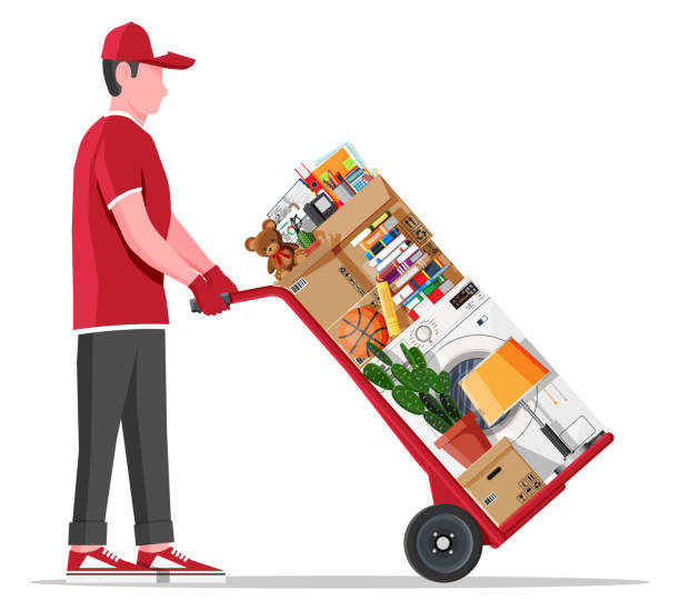 Hand truck and package for transportation. Mover with hand truck and package for transportation. Moving to new house. Family relocated to new home. Paper cardboard boxes with various household thing. Vector illustration in flat style mover delivery person box hand truck stock illustrations