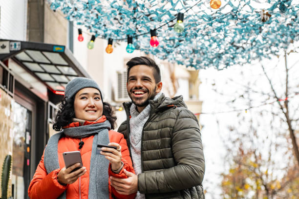istock Young couple shopping online during holidays 1285943457