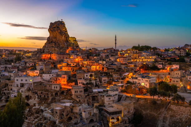 Ortahisar natural rock castle and town, Cappadocia, Turkey. Ortahisar natural rock castle and town, Cappadocia, Turkey. uchisar stock pictures, royalty-free photos & images