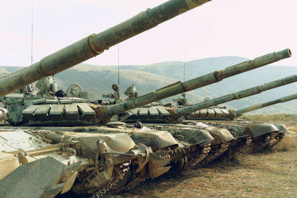 istock Russian battle tanks at tankodrome in mountains 1285943801