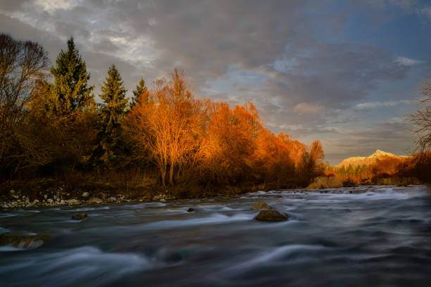 istock Krivan shield with Bela river in autumn colors 1285943871