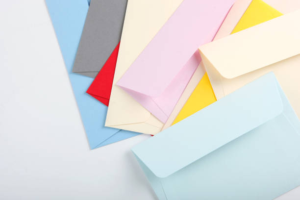 istock Paper color envelope for letters on a colored background in the air 1285943900