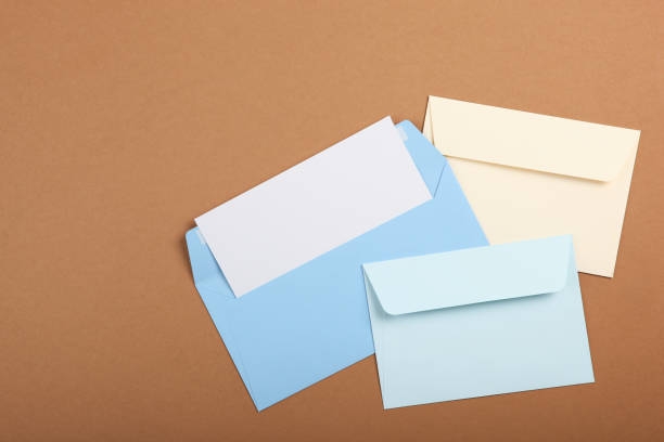 istock Paper color envelope for letters on a colored background in the air 1285944007