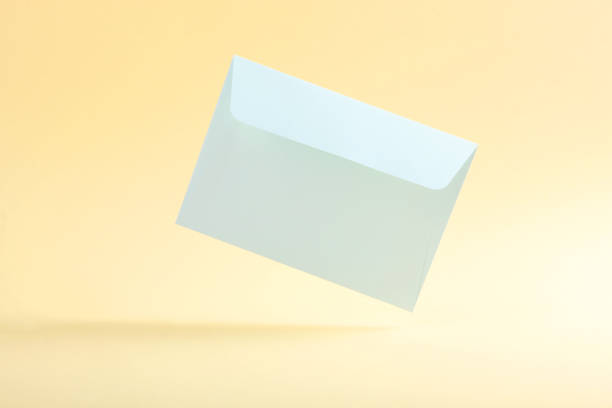 istock Paper color envelope for letters on a colored background in the air 1285944174