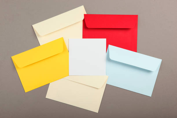 istock Paper color envelope for letters on a colored background in the air 1285944229
