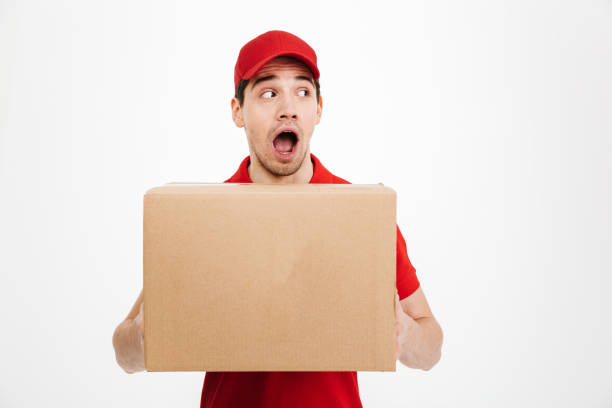 istock Shocked excited delivery man 1285946935
