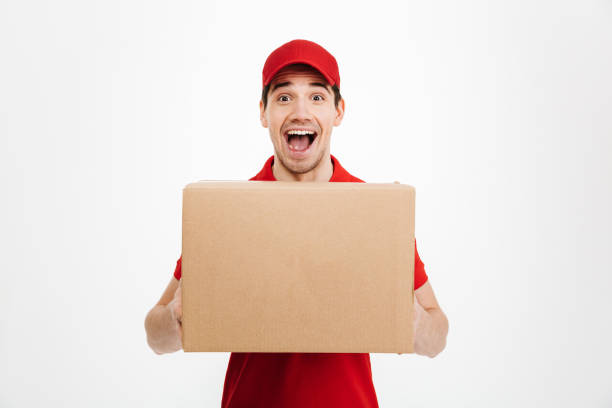 istock Shocked excited delivery man 1285947037