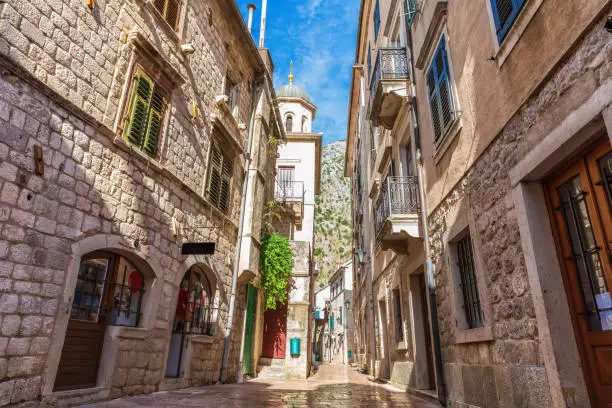 Medieval street in the Old Town of Kotor not far from Saint Michael Church, Montenegro.
