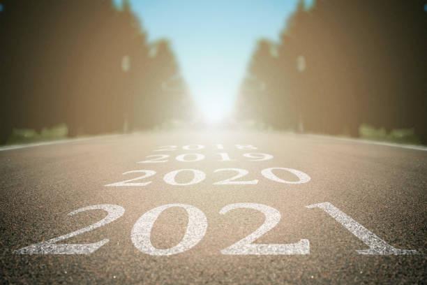 istock asphalt road in a field. 2021 1285951852