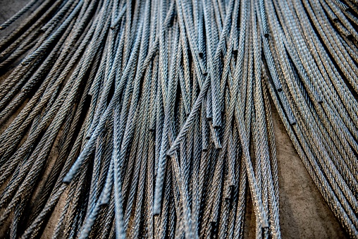 waste of iron and other metals\nMacro images of wire and steel cables