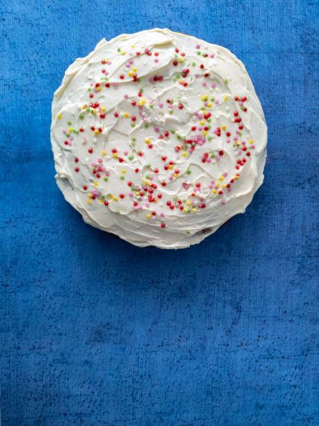istock Dish with a delicious carrot cake on the blue table 1285956130