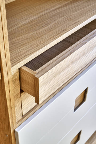 istock Modern wardrobe with finger pull design. Wooden wardrobe with light gray cabinet doors. Modern furniture 1285957905