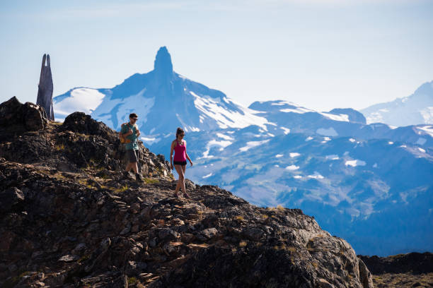 istock Couple bonding in the mountains on a summer vacation 1285958037