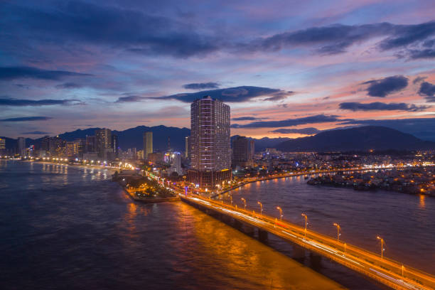 Drone view of Tran Phu bridge in Nha Trang city at sunset, Khanh Hoa province, central Vietnam