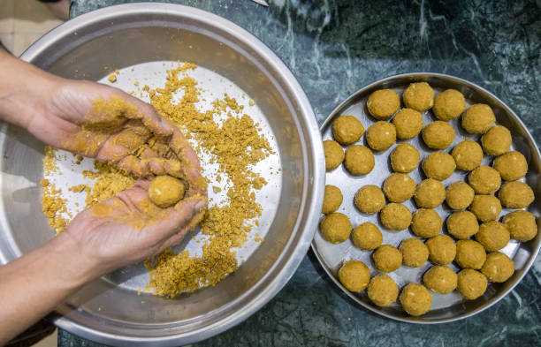 istock besan laddoos are being made for festivals in india 1285958737