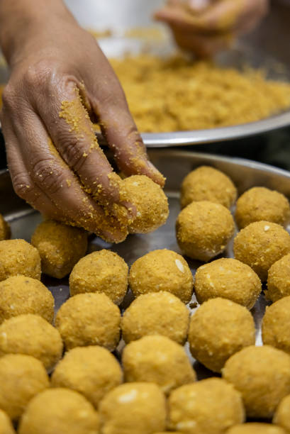 istock besan laddoos are being made for festivals in india 1285959413
