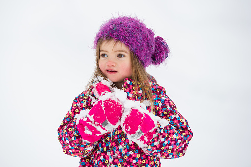 Cute child in Santa hat prepared to make cookies for Christmas, on white background