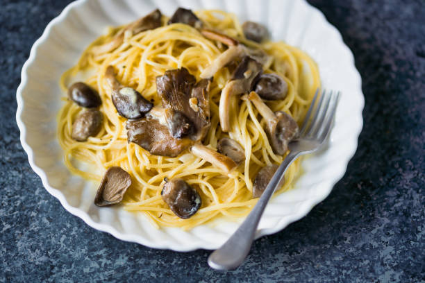 istock rustic italian spaghetti pasta in mushroom cream sauce 1285960640