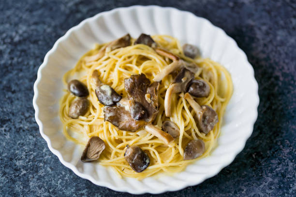 istock rustic italian spaghetti pasta in mushroom cream sauce 1285960664
