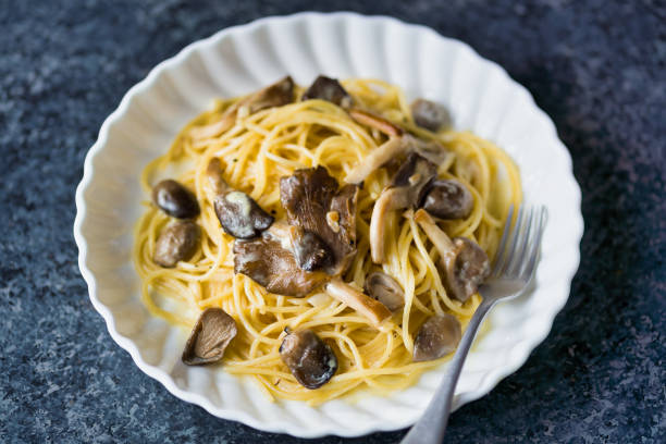 istock rustic italian spaghetti pasta in mushroom cream sauce 1285960704