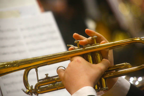 istock Student Musician Plays the Trumpet 1285960770