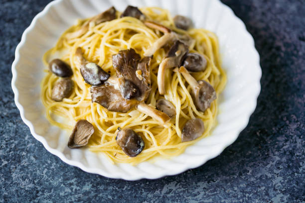 istock rustic italian spaghetti pasta in mushroom cream sauce 1285961320