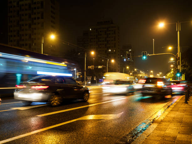 istock urban traffic in a rainy night city 1285963636
