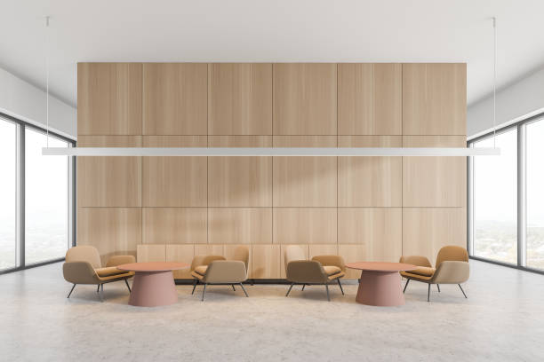 istock Round tables and armchairs in modern cafe 1285963933