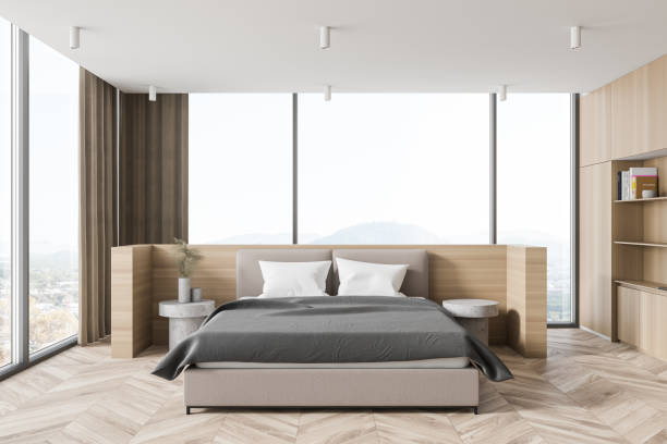 istock Modern wooden master bedroom interior 1285964034