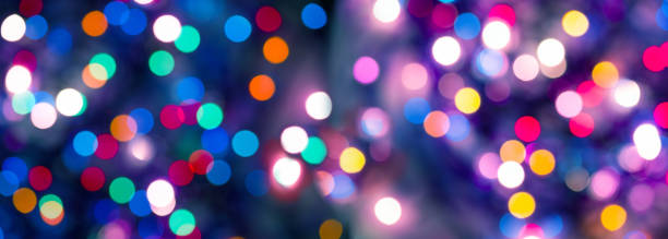 istock Abstract colorful shiny bokeh in Christmas night 1285964116