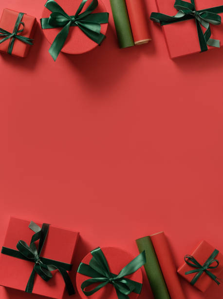 istock Christmas frame with red and green gifts on red, 1285965795