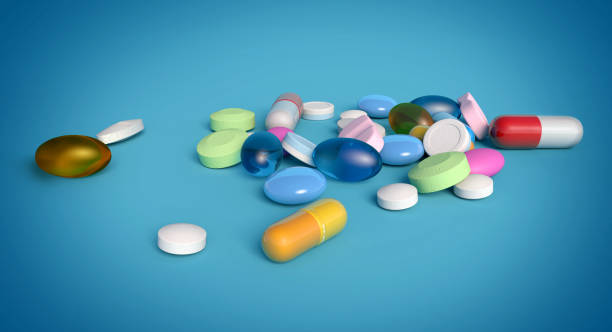 istock heap of medications on blue colored background 1285966042