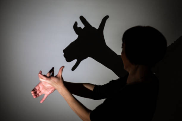 istock play shadow projected against a white background, rudolph reindeer 1285967428