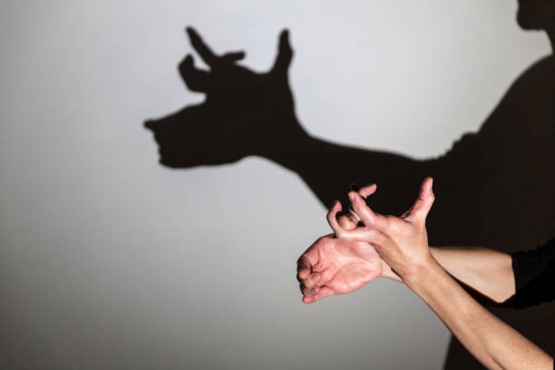 istock play shadow projected against a white background, rudolph reindeer 1285967463