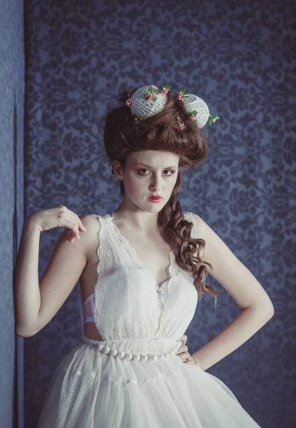istock Fashion model in vintage clothes 1285969143