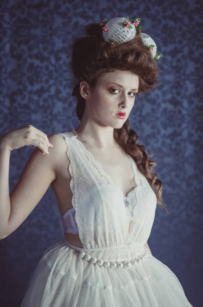 istock Fashion model in vintage clothes 1285969184