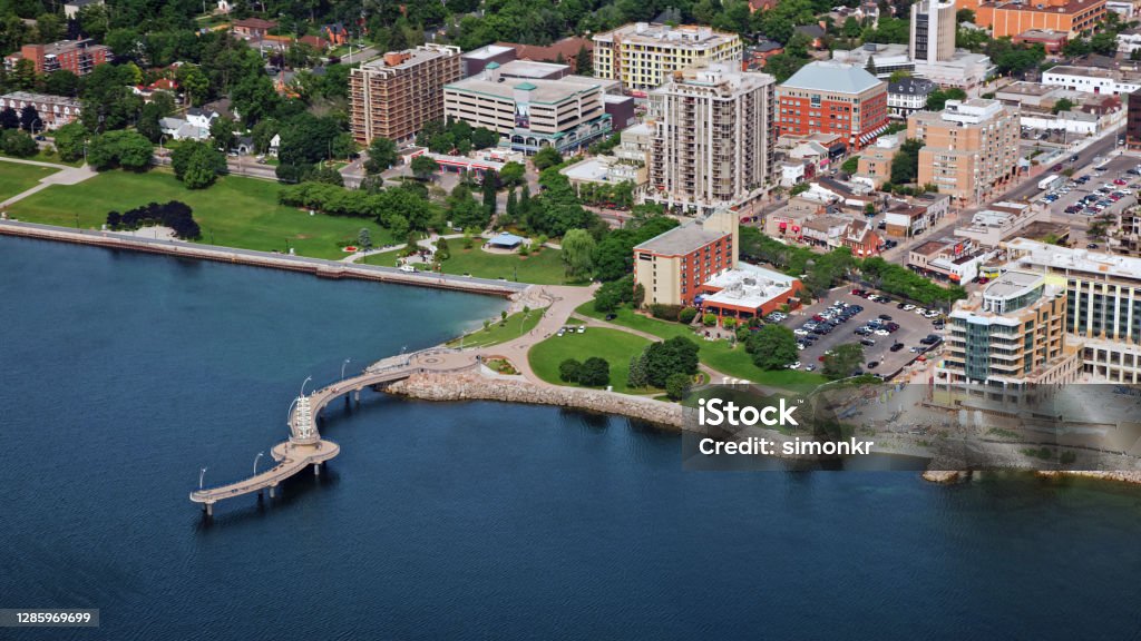 View of Brant Street Pier with city Aerial view of Burlington city with Brant Street Pier and Ontario Lake, Toronto, Ontario, Canada. Burlington - Ontario Stock Photo