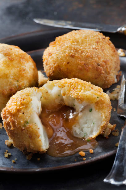 istock Creamy Mashed Potato Croquettes Stuffed with Gravy 1285971172