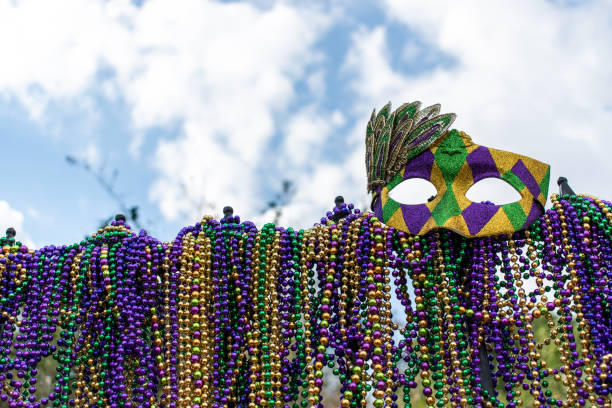 istock iron fence covered with Mardi Gras beads 1285971361