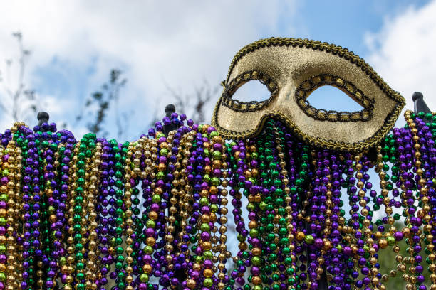 istock iron fence covered with Mardi Gras beads 1285971593