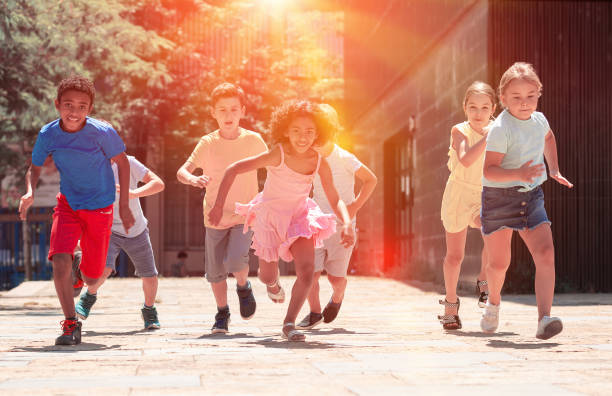 istock Activity children compete in the summer street 1285973984