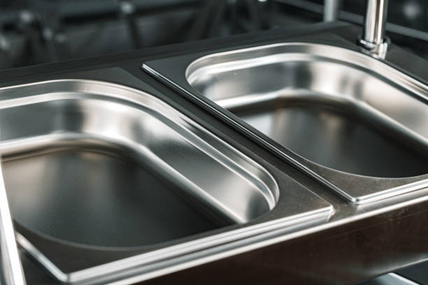 istock Industrial kitchen metal trays for buffet catering 1285978812