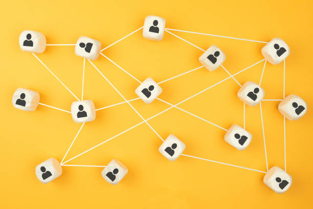 istock connections between people, social network concept with wooden blocks 1285979009