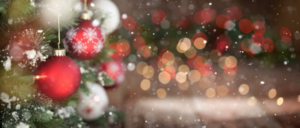 istock Christmas Tree, Red and White Ornaments against a Defocused Lights Background 1285979670