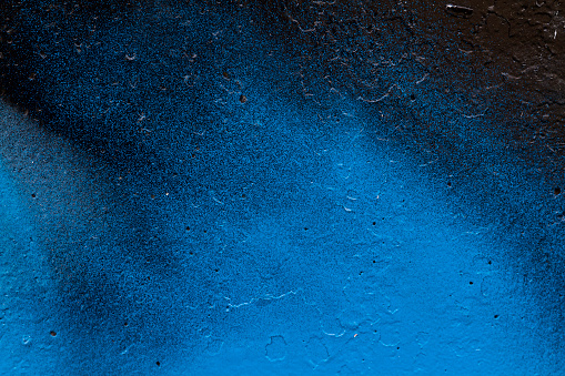 Blue painted wall with shades of dark blue gradients