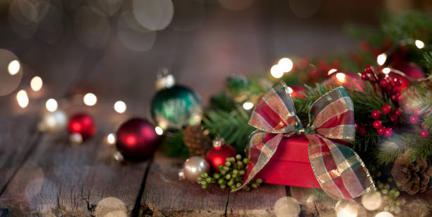 istock Christmas Gift on Old Wood Background 1285981277