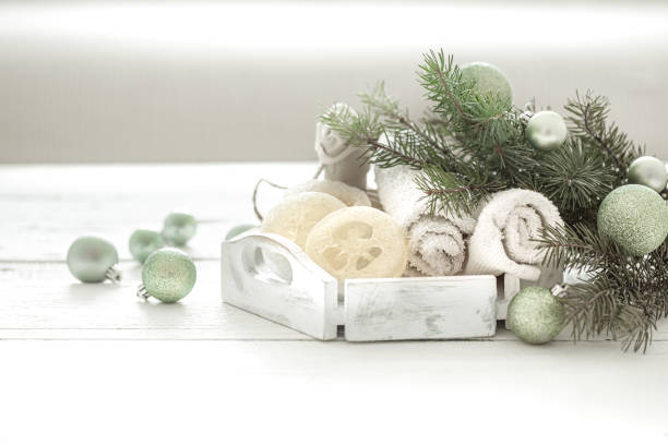 istock Spa composition with Christmas decoration on light blurred background copy space. 1285981608